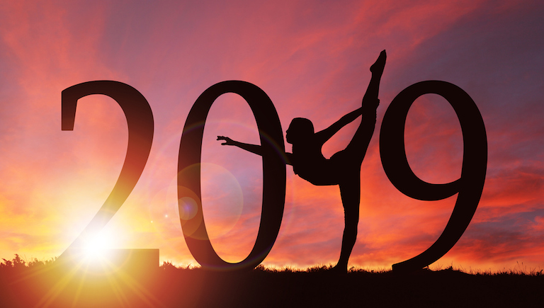 2019 New Year Silhouette of Girl Dancing at Golden Sunrise